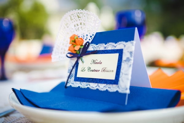 Blue wedding place name with lace detail