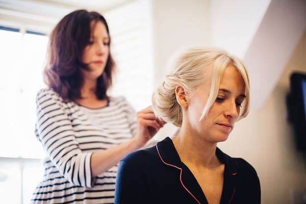 Bride having hair done