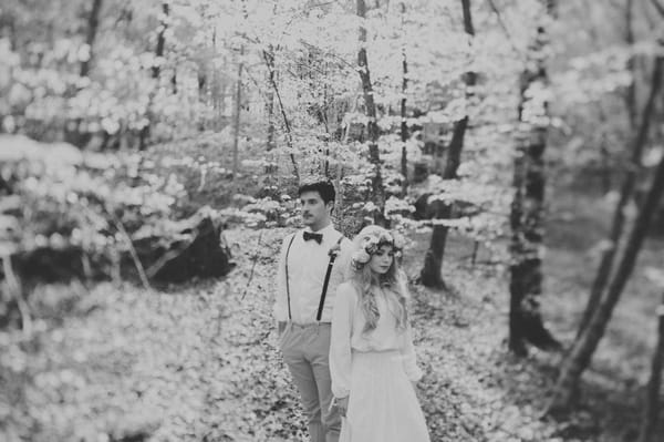 Bride and groom in woods