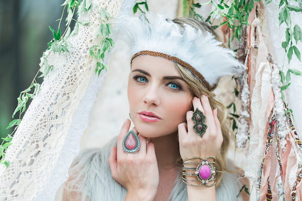 Bohemian bridesmaid with feather headpiece