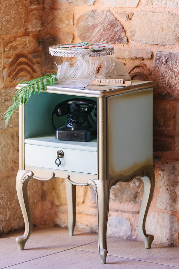 Telephone table with old telephone