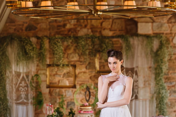 Bride with hand under chin