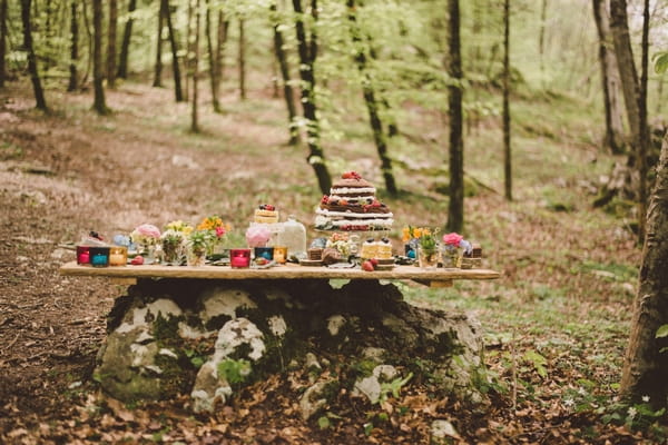 Wedding cake table in woods