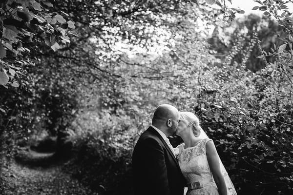 Bride and groom kissing