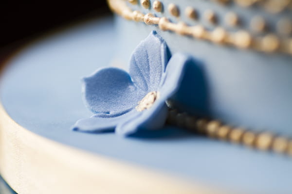 Sugar flower on base of wedding cake