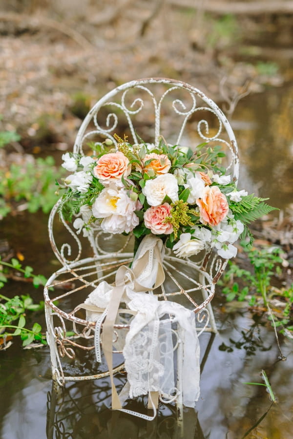 Flowers on chair in creek