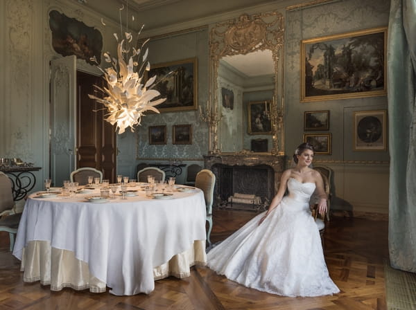 Bride sitting in Blue Room at Waddesdon Manor