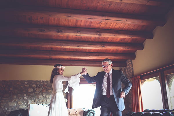 Bride and father hi five