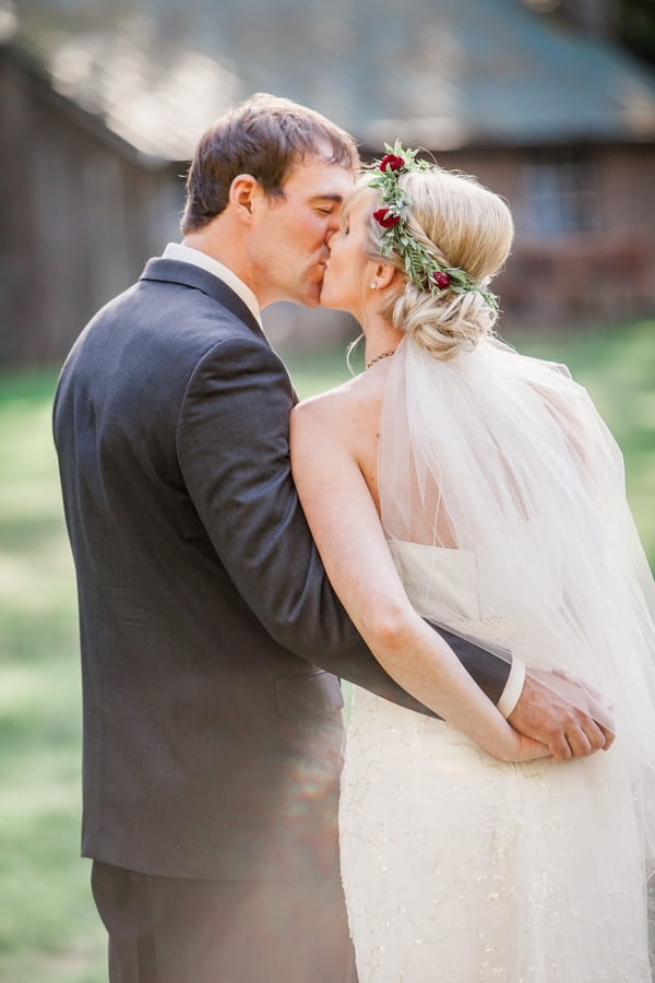 Bride and groom kiss