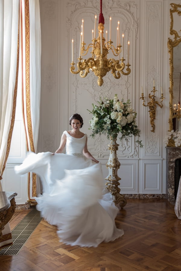 Bride twirling in dress