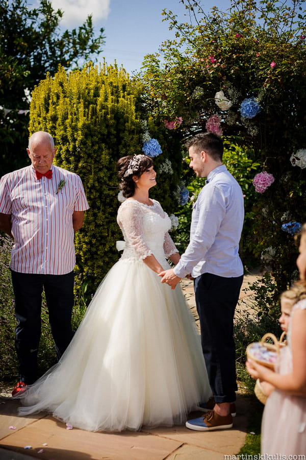 Bride and groom saying vows