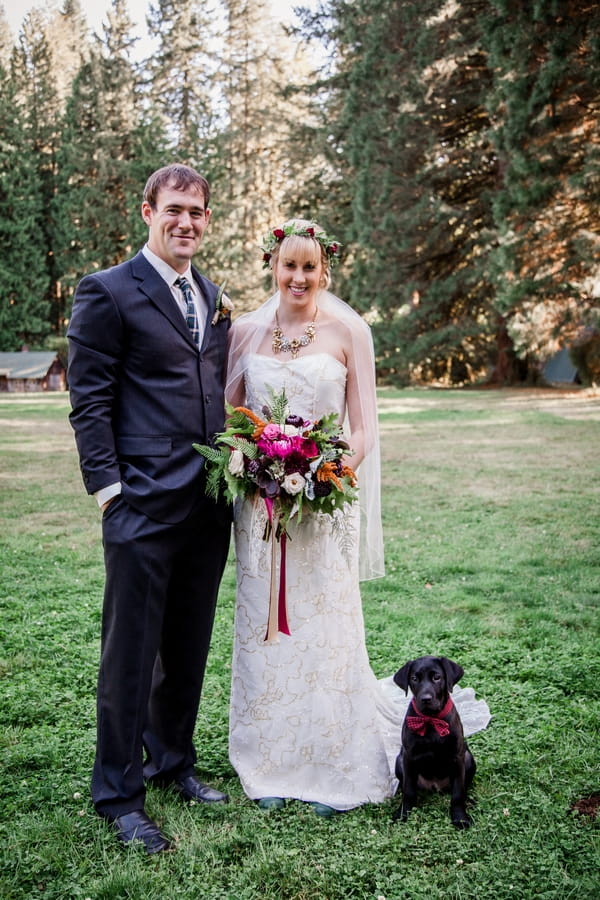 Bride and groom with dog