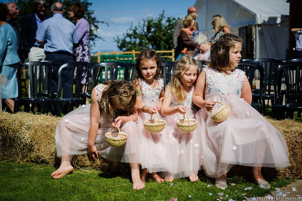 Flowers girls with baskets of confetti