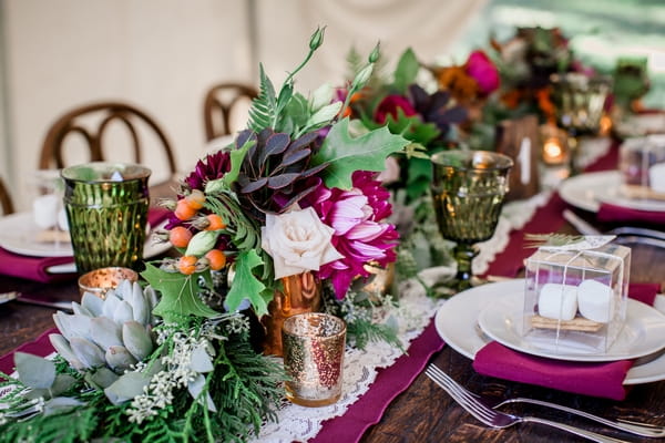 Rustic floral wedding table centrepiece