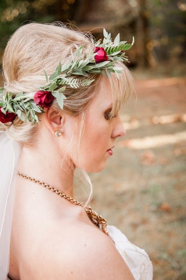 Bride wearing flower and leaf crown