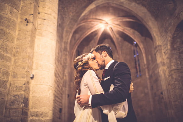 Bride and groom kiss