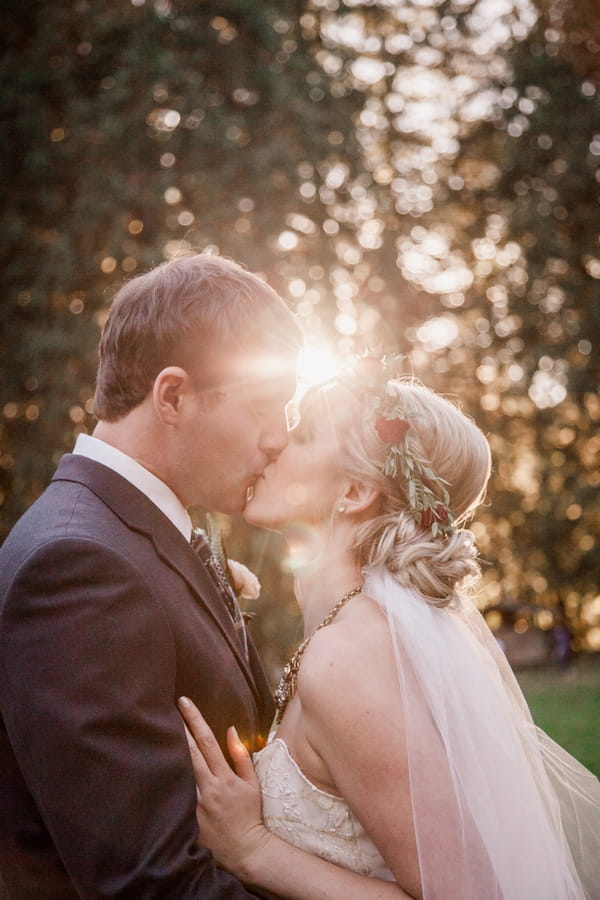 Bride and groom kissing