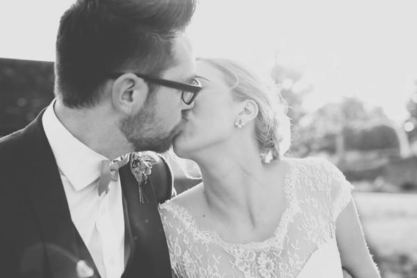 Bride and groom kissing