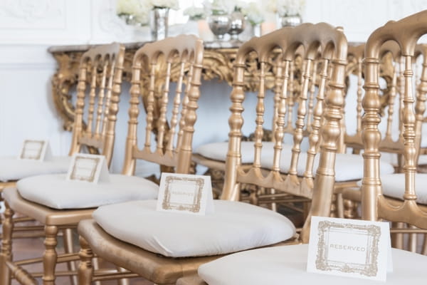 Name cards on elegant wedding chairs