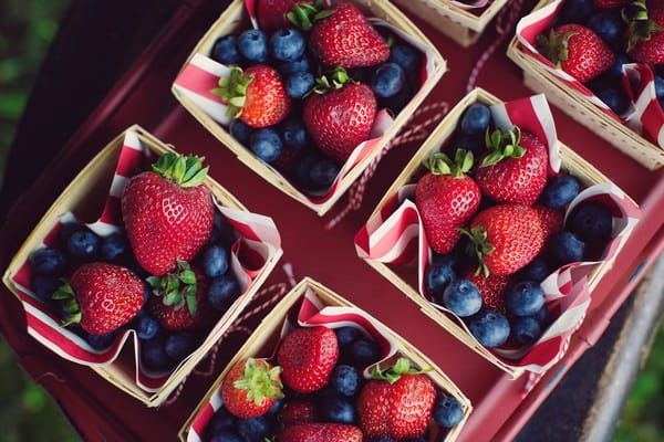 Punnets of blueberries and strawberries