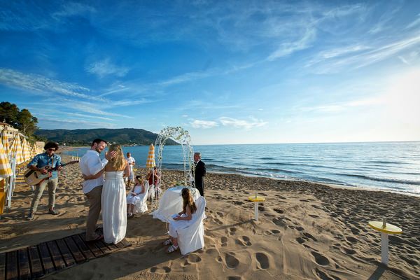 Vow renewal on beach in Italy