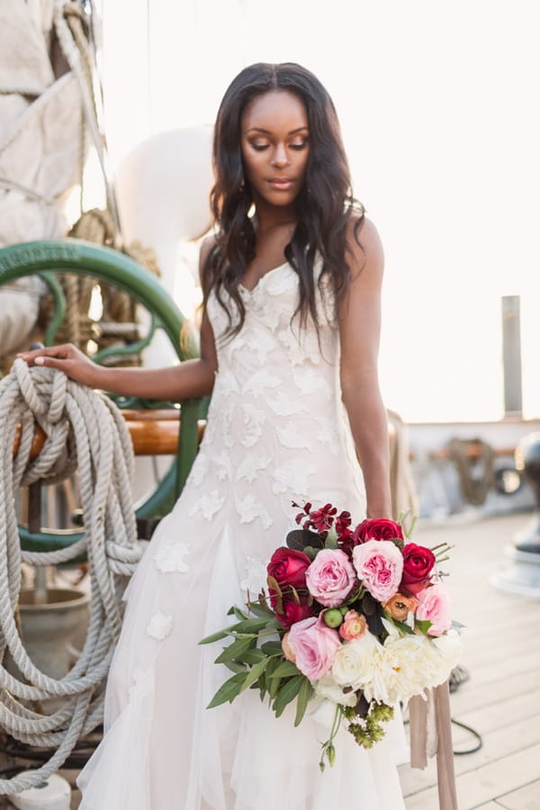 Bride on the Tall Ship Elissa holding bouquet