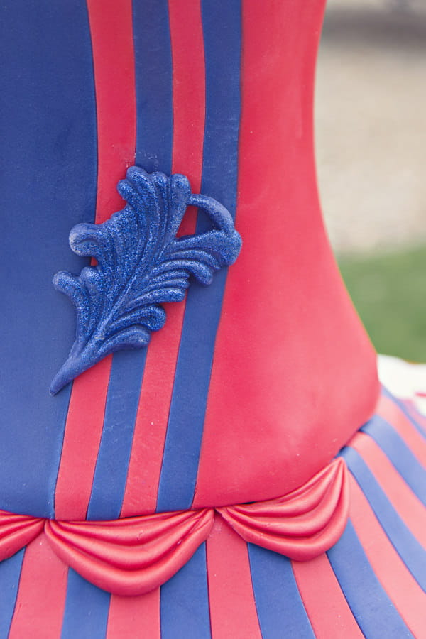 Blue and red detail on carnival wedding cake