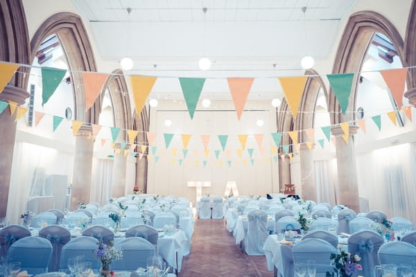Bunting and wedding tables in Avenue Halls in Kew