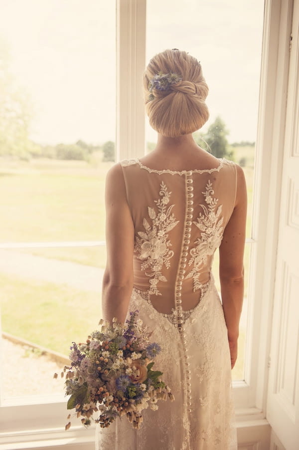 Lace detail on back of bride's dress