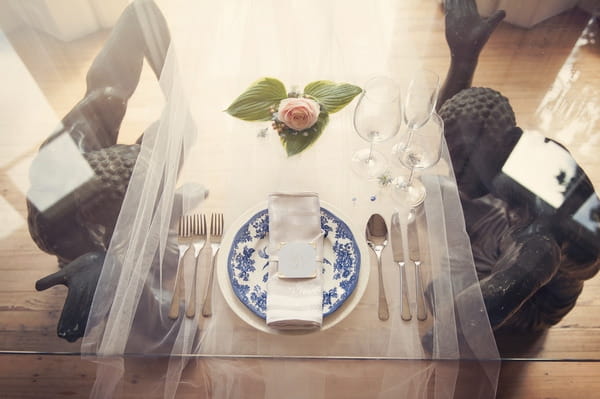 Wedding table setting on glass table