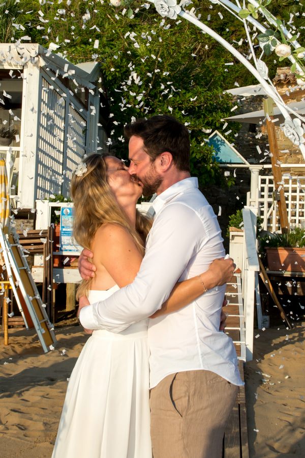 Couple kissing after renewing vows