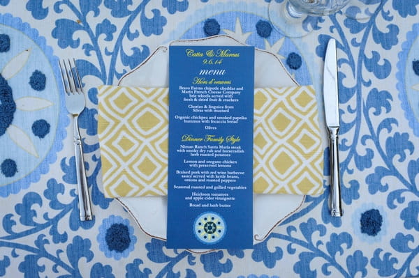 Blue and yellow wedding place setting