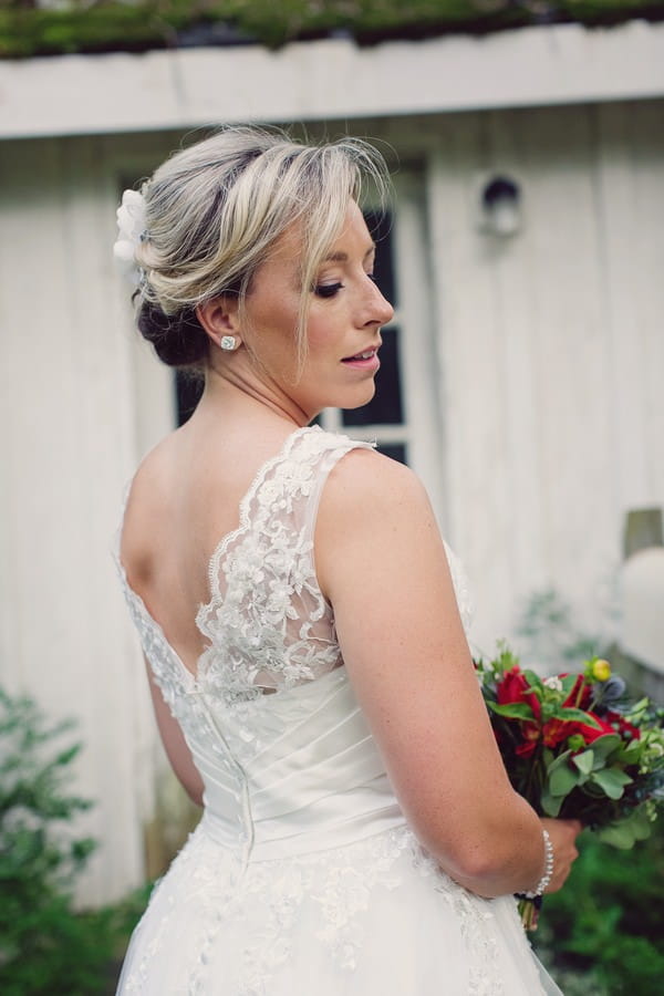 Lace details on back of bride's wedding dress