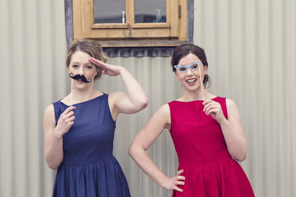 Vintage brides with prop moustache and glasses