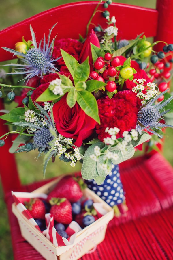 Red bridal bouquet and strawberries