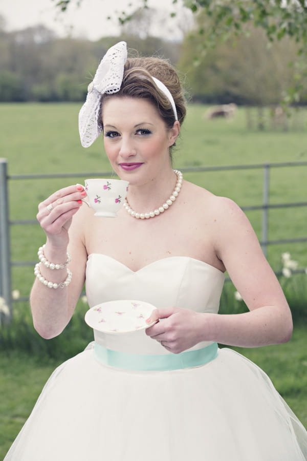 Bride with vintage cup and saucer