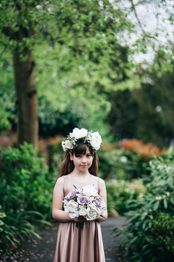 Flower girl holding bouquet