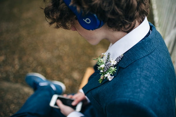 Young groomsman's buttonhole