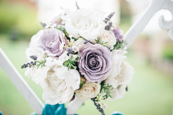 Wedding bouquet with purple flowers