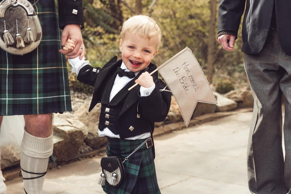 Young pageboy in kilt