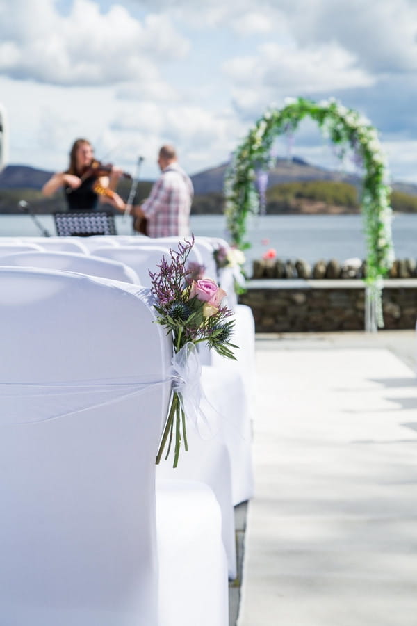 Flowers on wedding ceremony seat