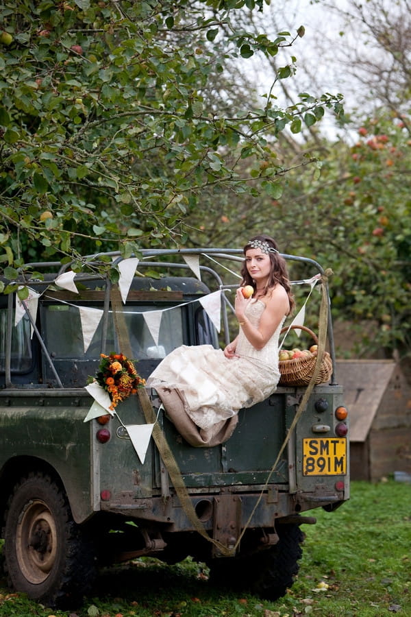 Bride on back of Land Rover