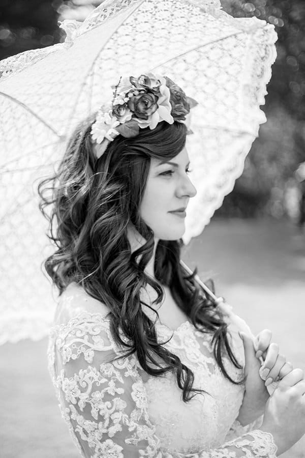 Bride with flower crown and parasol