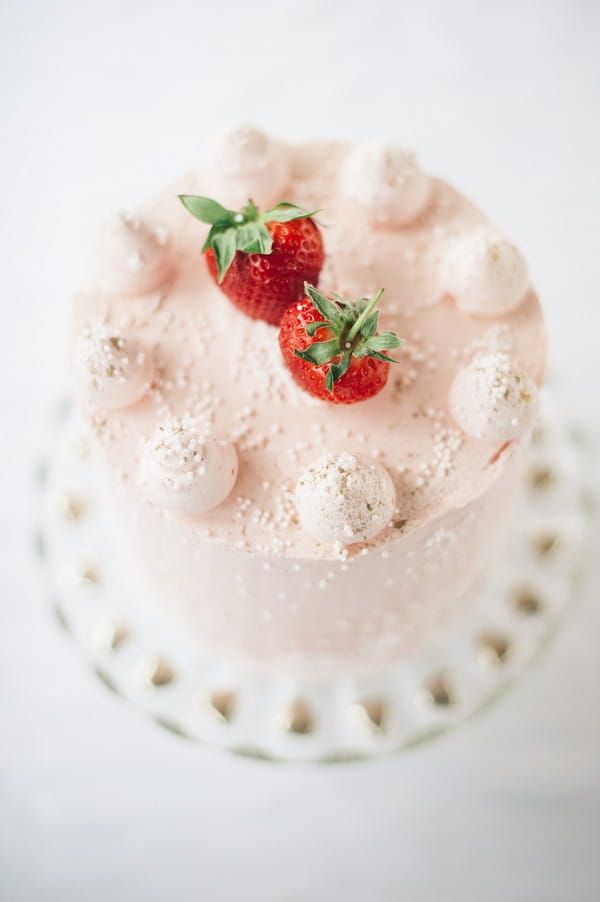 Top of small pink wedding cake