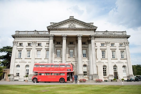 Red wedding bus outside Moor Park Mansion