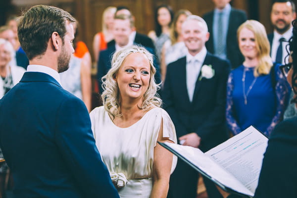Bride smiling during ceremony at Islington Town Hall