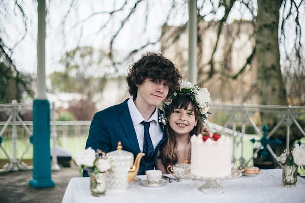 Young flower girl and groomsman