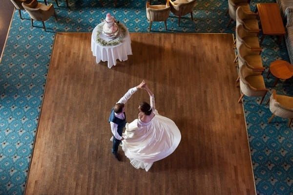 Bride and groom dancing alone