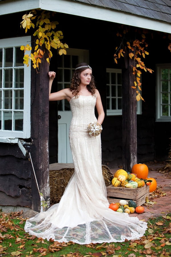 Bride in secret garden of Deer Park in autumn