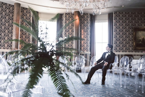 Retro groom waiting for bride in Duke of Cornwall Hotel